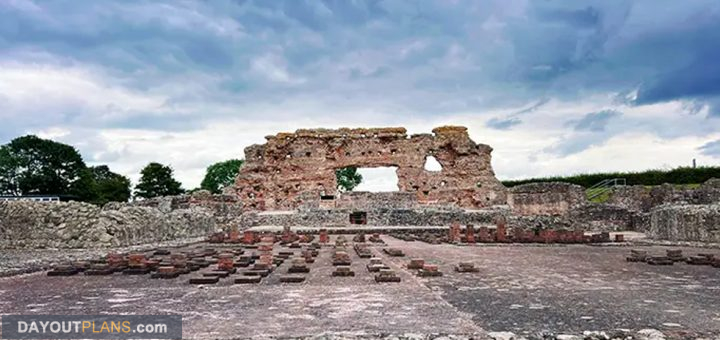 a stone building with a hole in the wall
